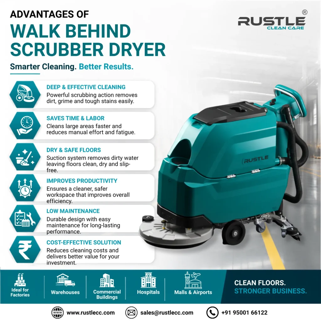 Walk behind scrubber dryer cleaning a warehouse floor